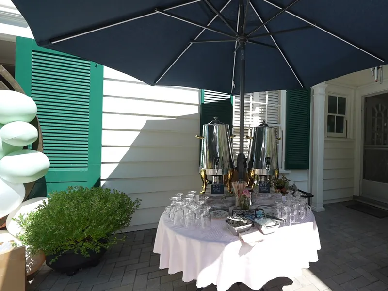 Coffee and beverage station set outdoors for a UCSC department gathering