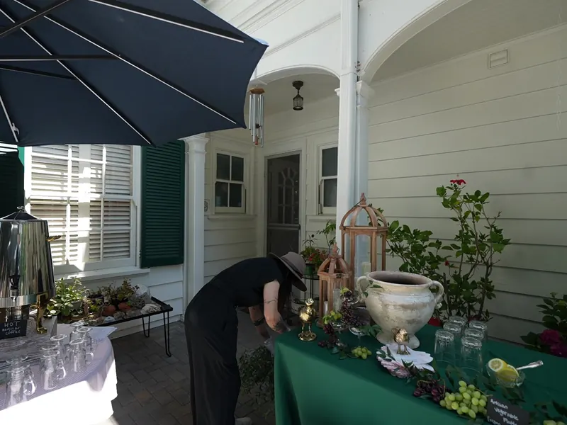 Catering team setting a garden buffet table for a Westside Santa Cruz party