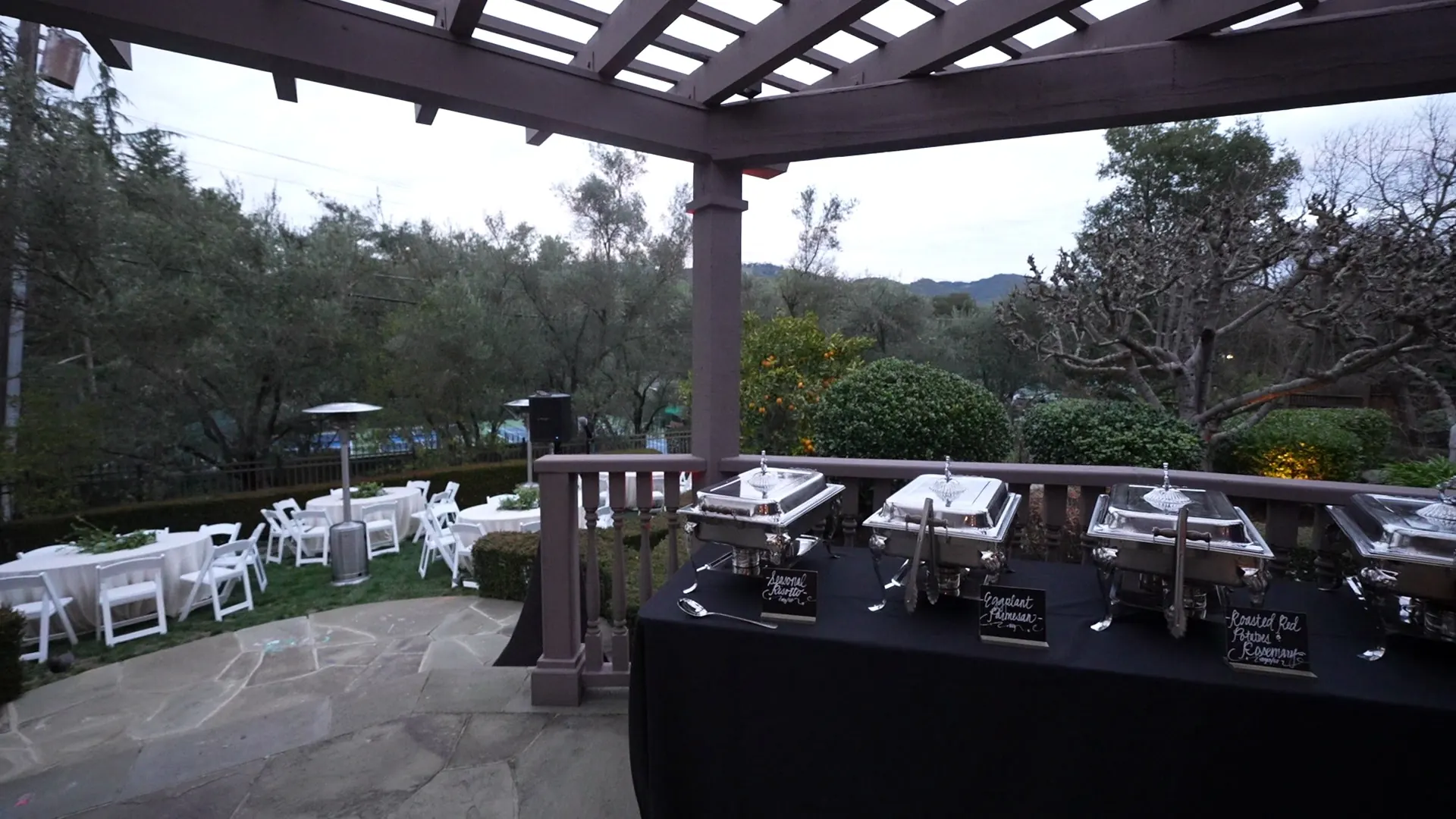 Buffet set beneath a pergola for an Aptos backyard dinner
